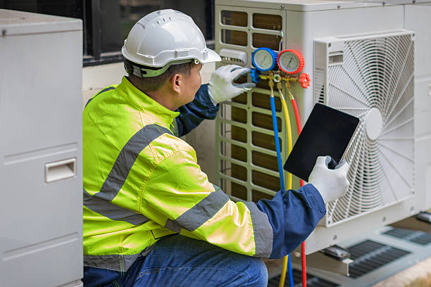 Professional Ac Installation technician working in Riegelsville, PA